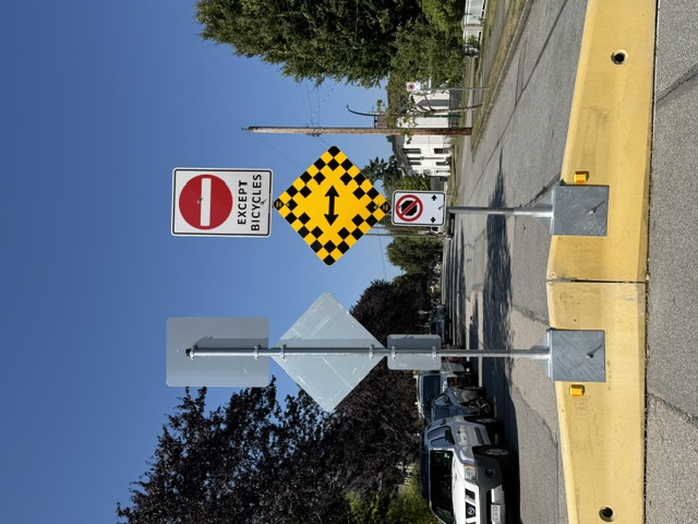 Traffic barrier and restricted access sign on an East Vancouver street